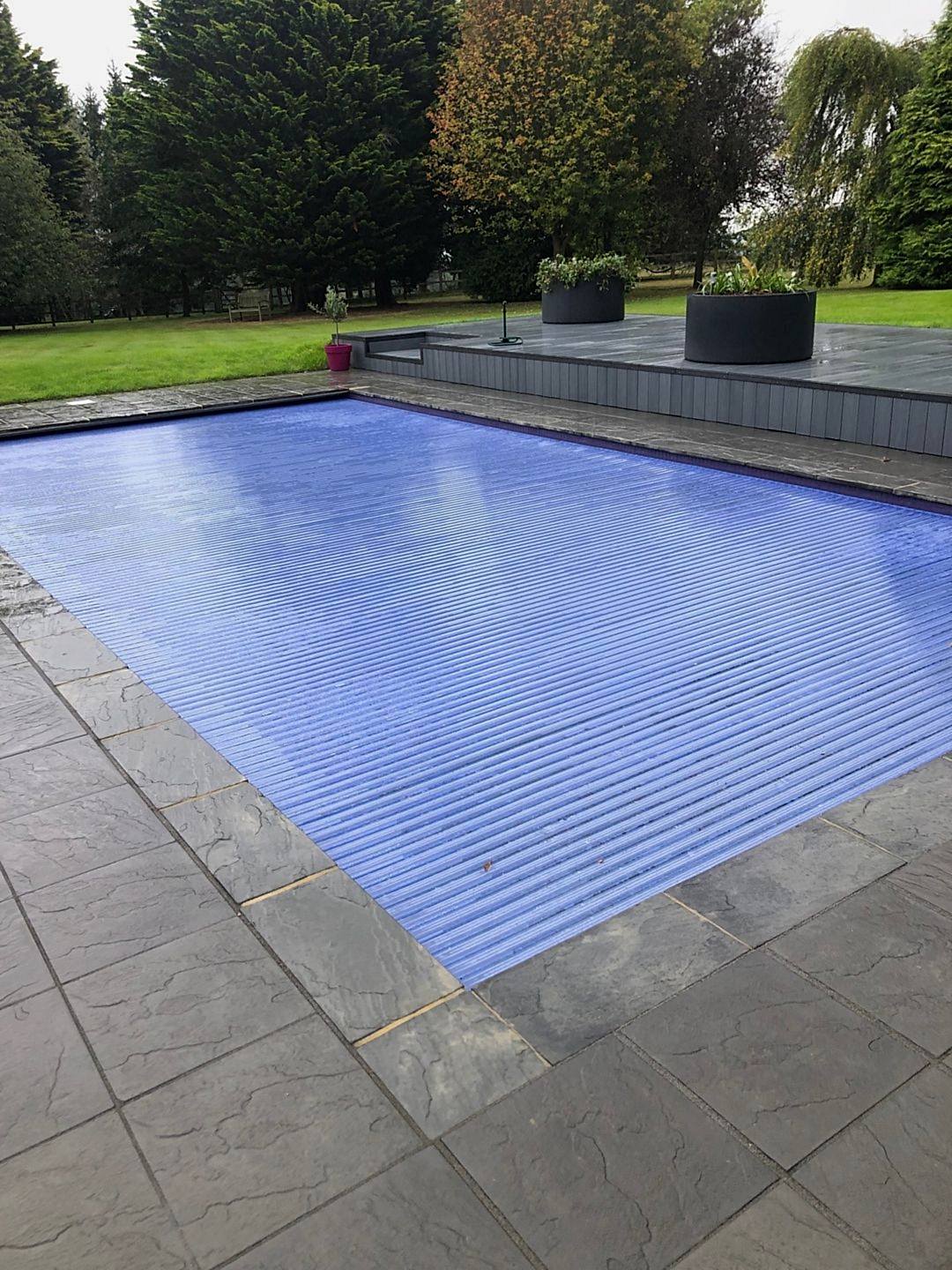 Outdoor semi automatic Pool Cover installed by UK Swimming Pools Ltd