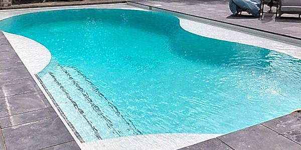 Finished shot of the refurbished outdoor swimming pool