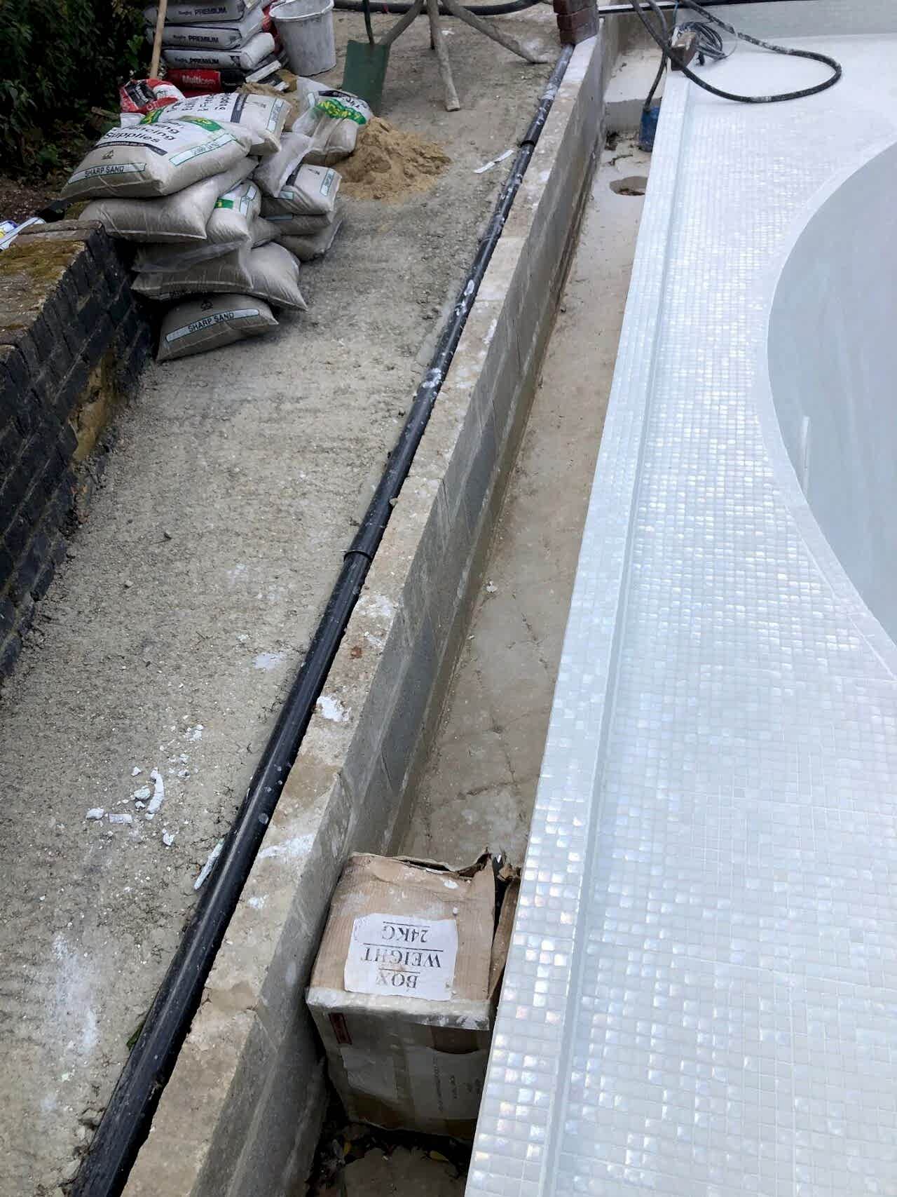 The automated safety pool cover was customized to fit the unique shape