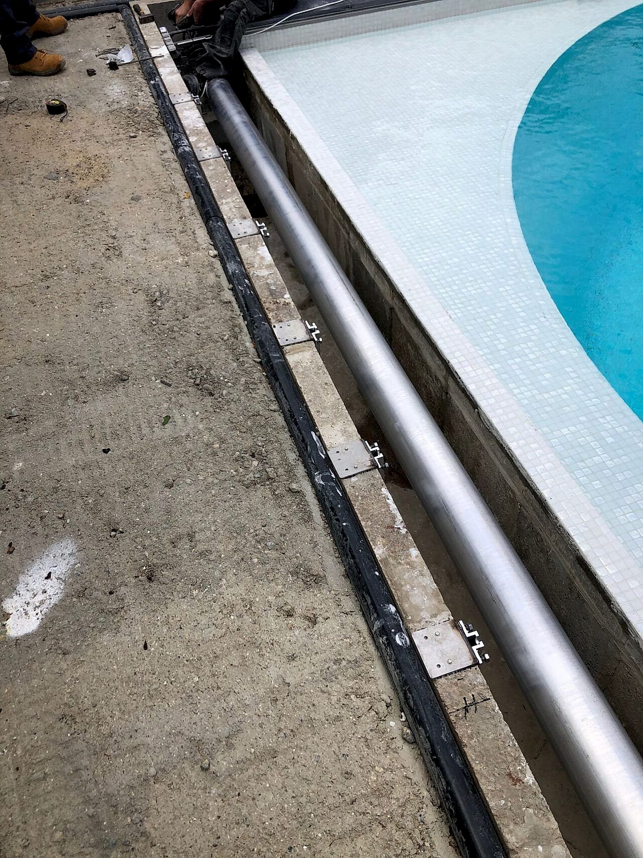 An automated safety pool cover was customized to fit the unique shape