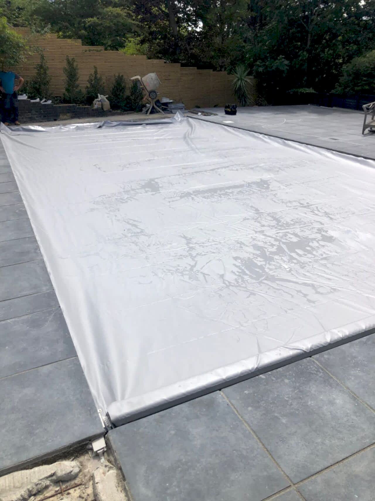 An automated safety pool cover was customized to fit the unique shape