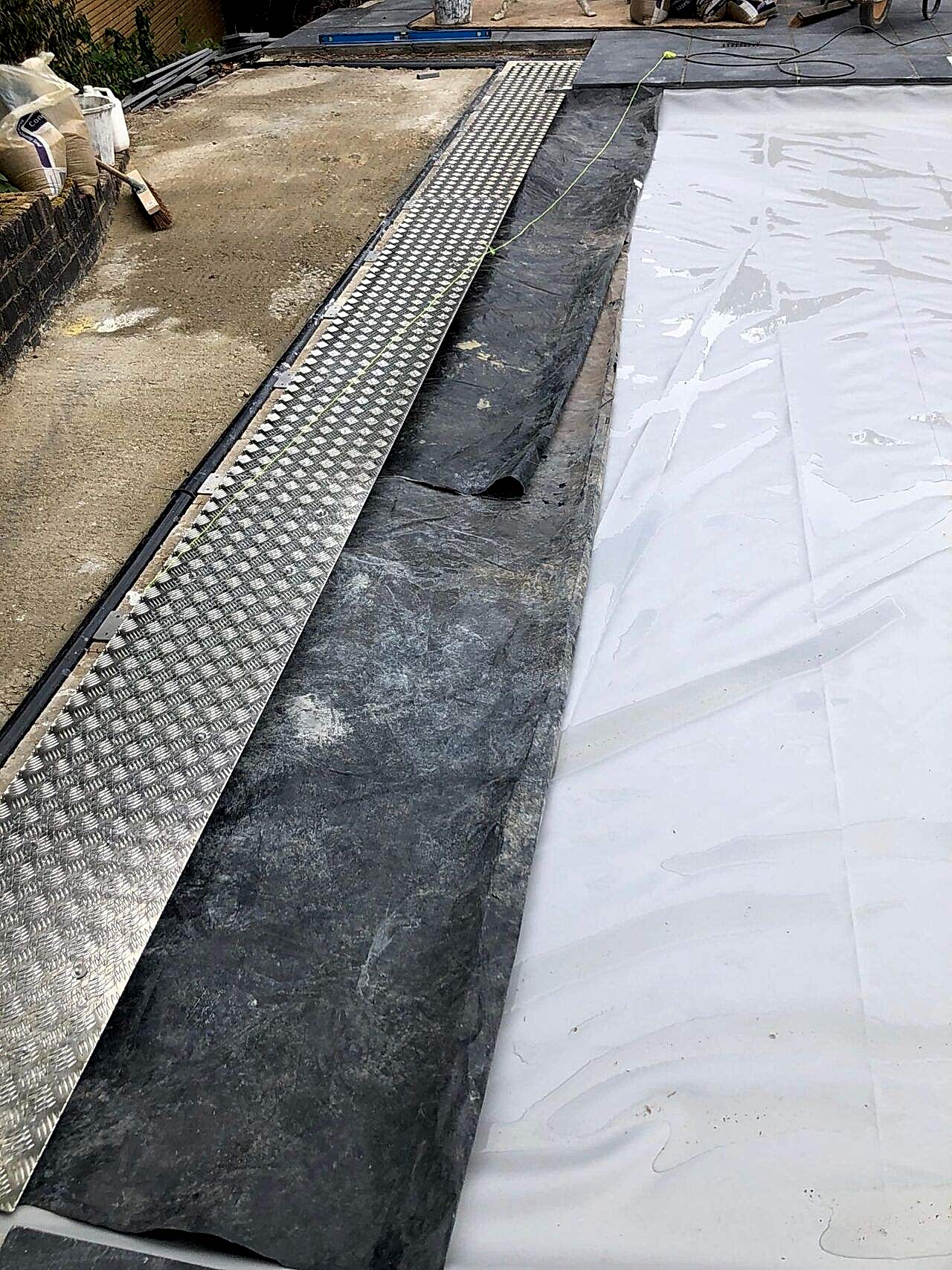 New surface skimmers and a twin main drain sump system were installed to meet current standard