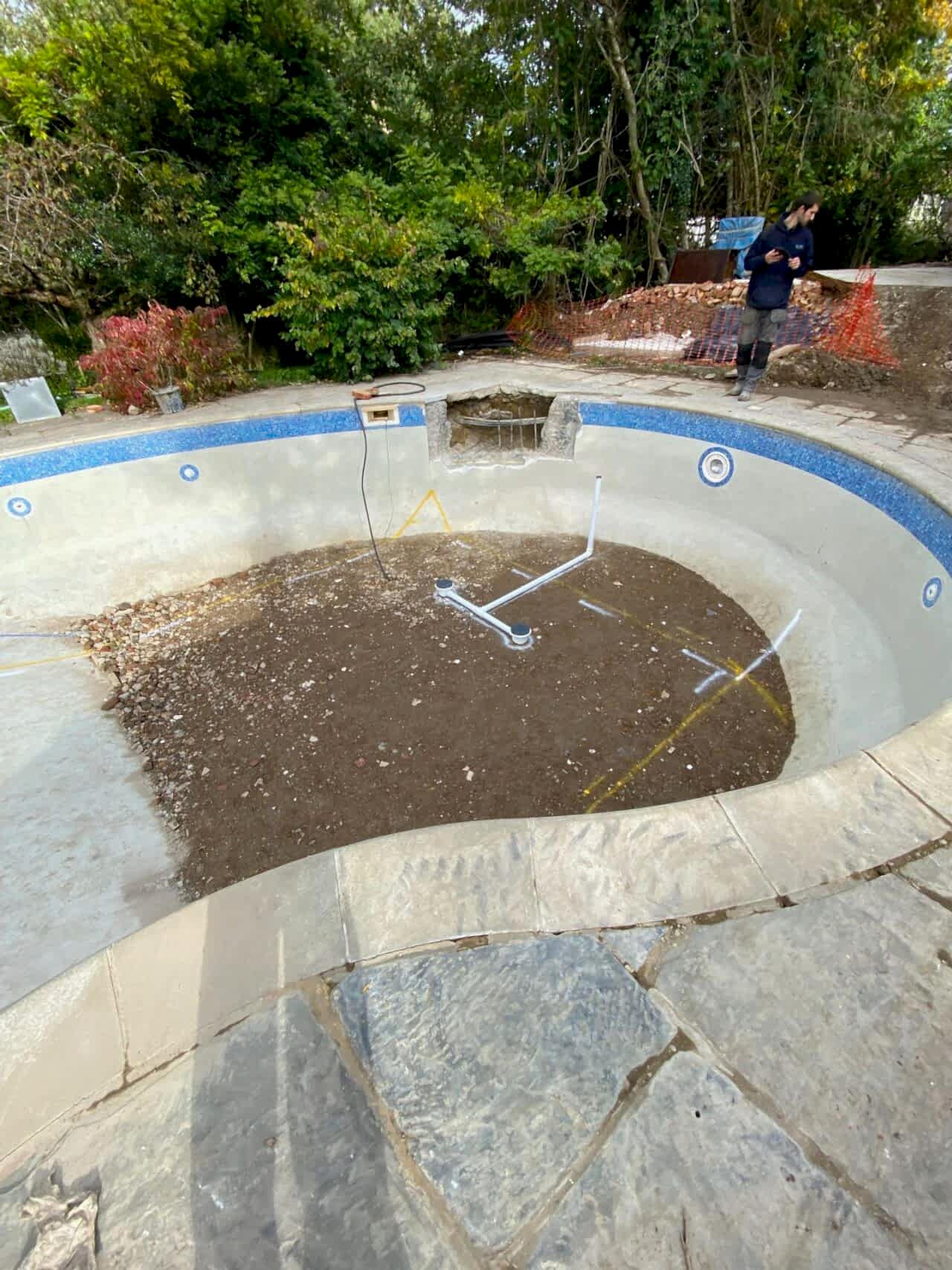 After the pool has been drained, the team of UK Swimming Pools started the deconstruction