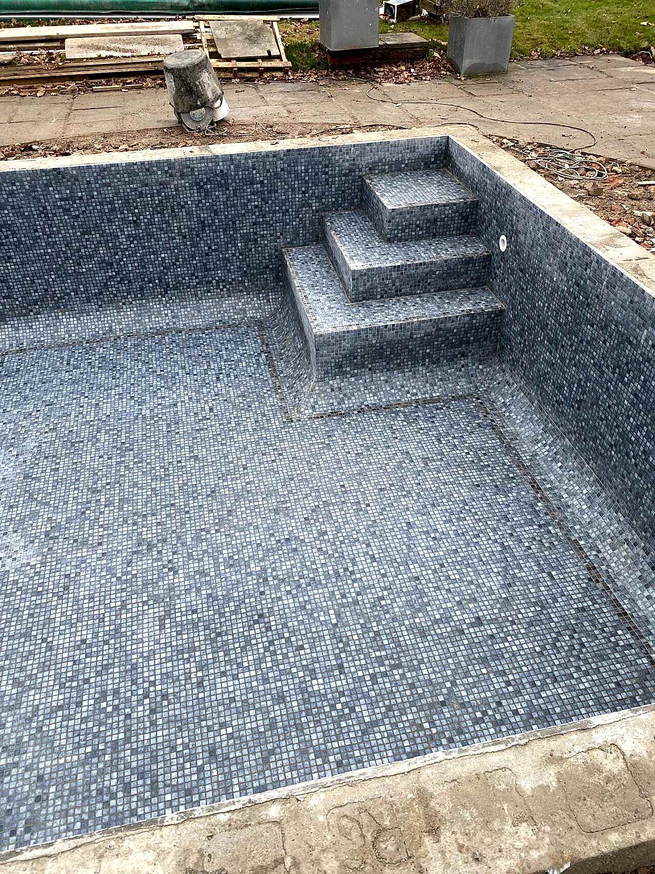 The entire swimming pool has been retiled with a new top-line mosaics by the UK Swimming Pools Team