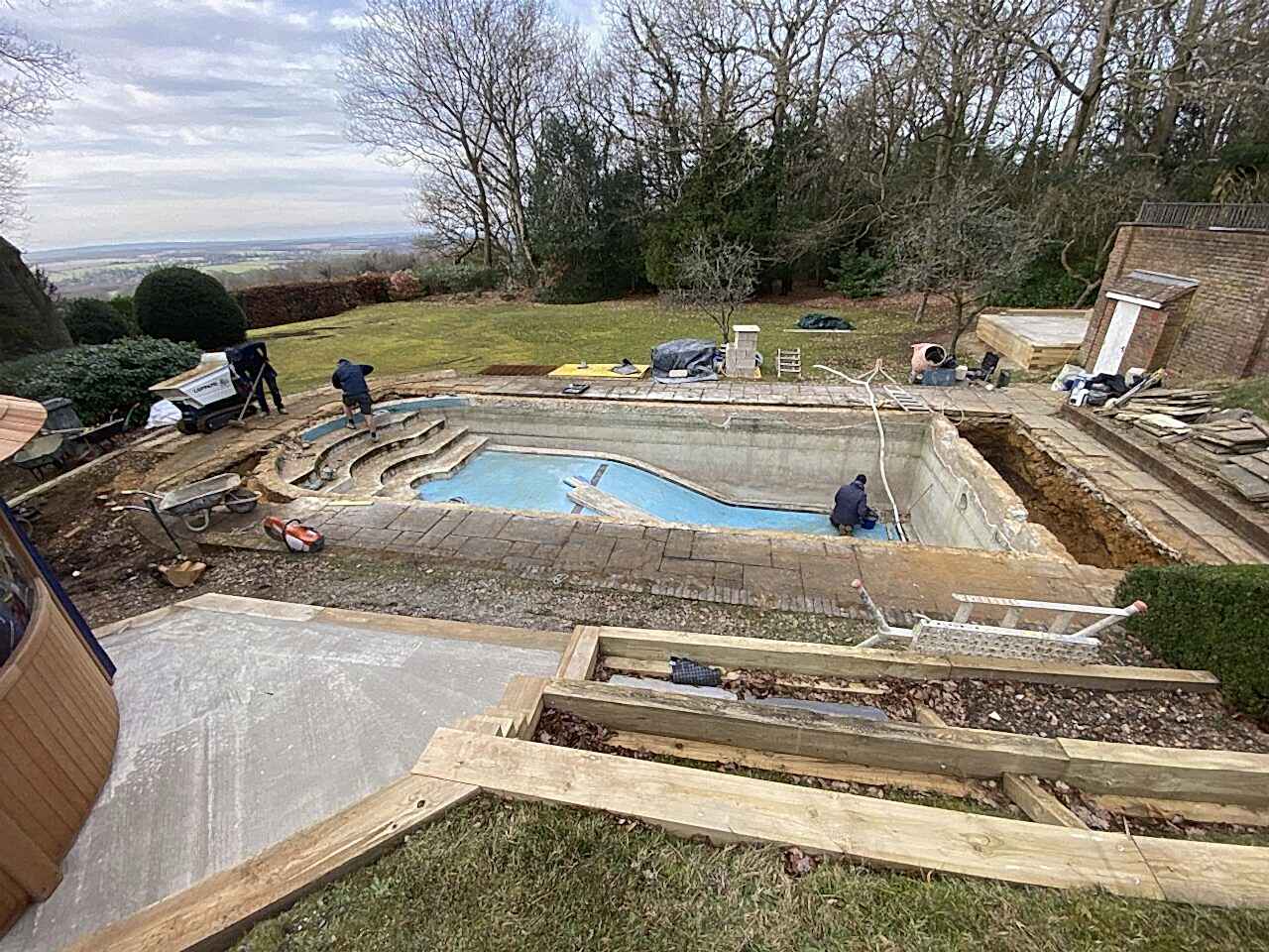 A unique “beaching” procedure to convert the curved end of the swimming pool into a straight, rectangular shape