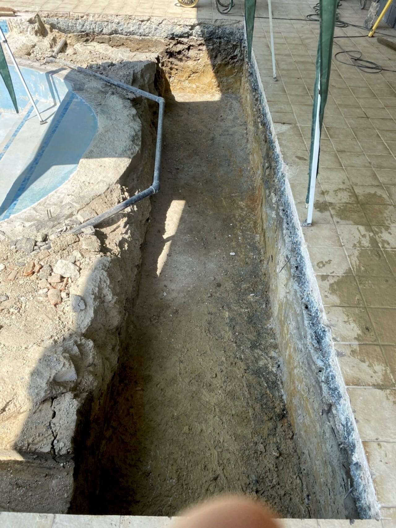 The space for the in-ground slatted cover system being carved