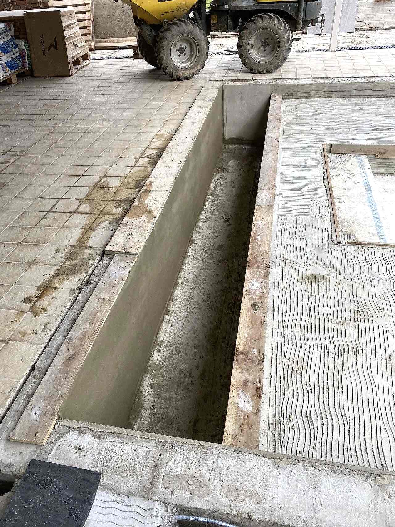 The storage space for the new pool cover is ready