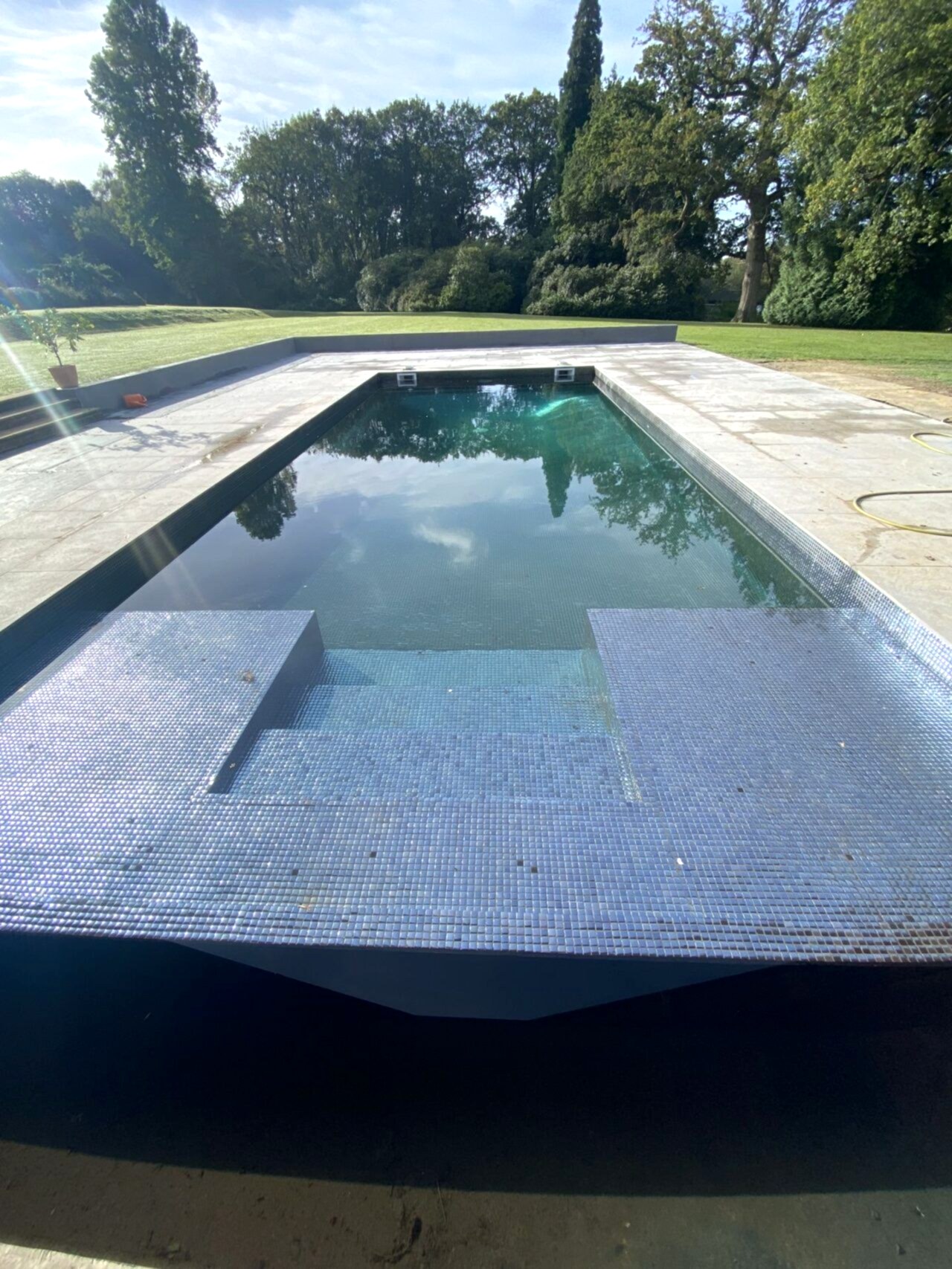 A finished view of the modern, streamlined design of the swimming pool