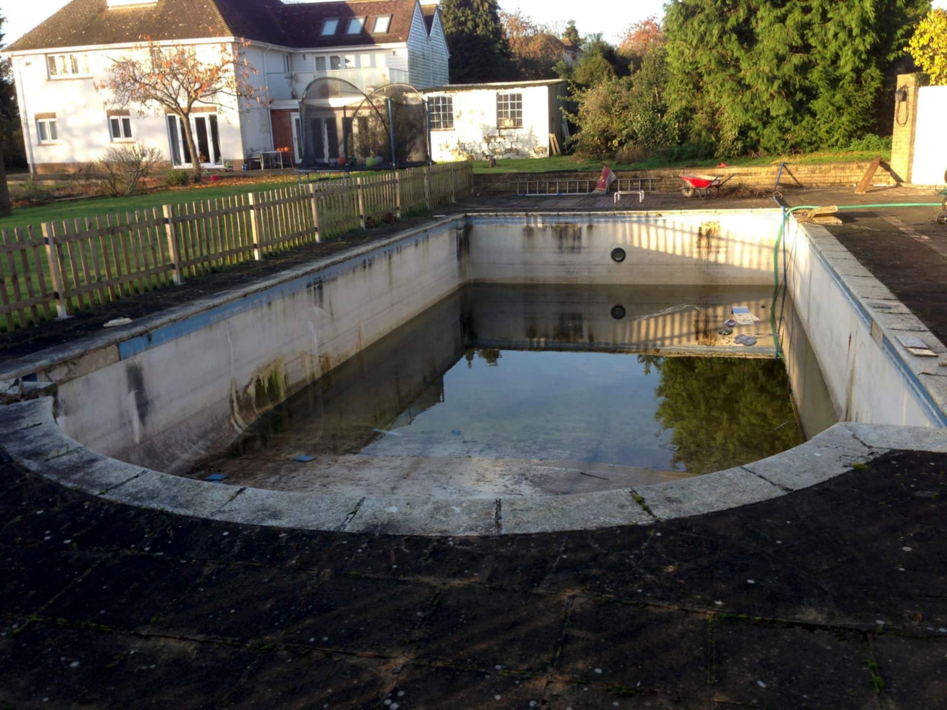 Refurbishment needed for this outdoor swimming pool