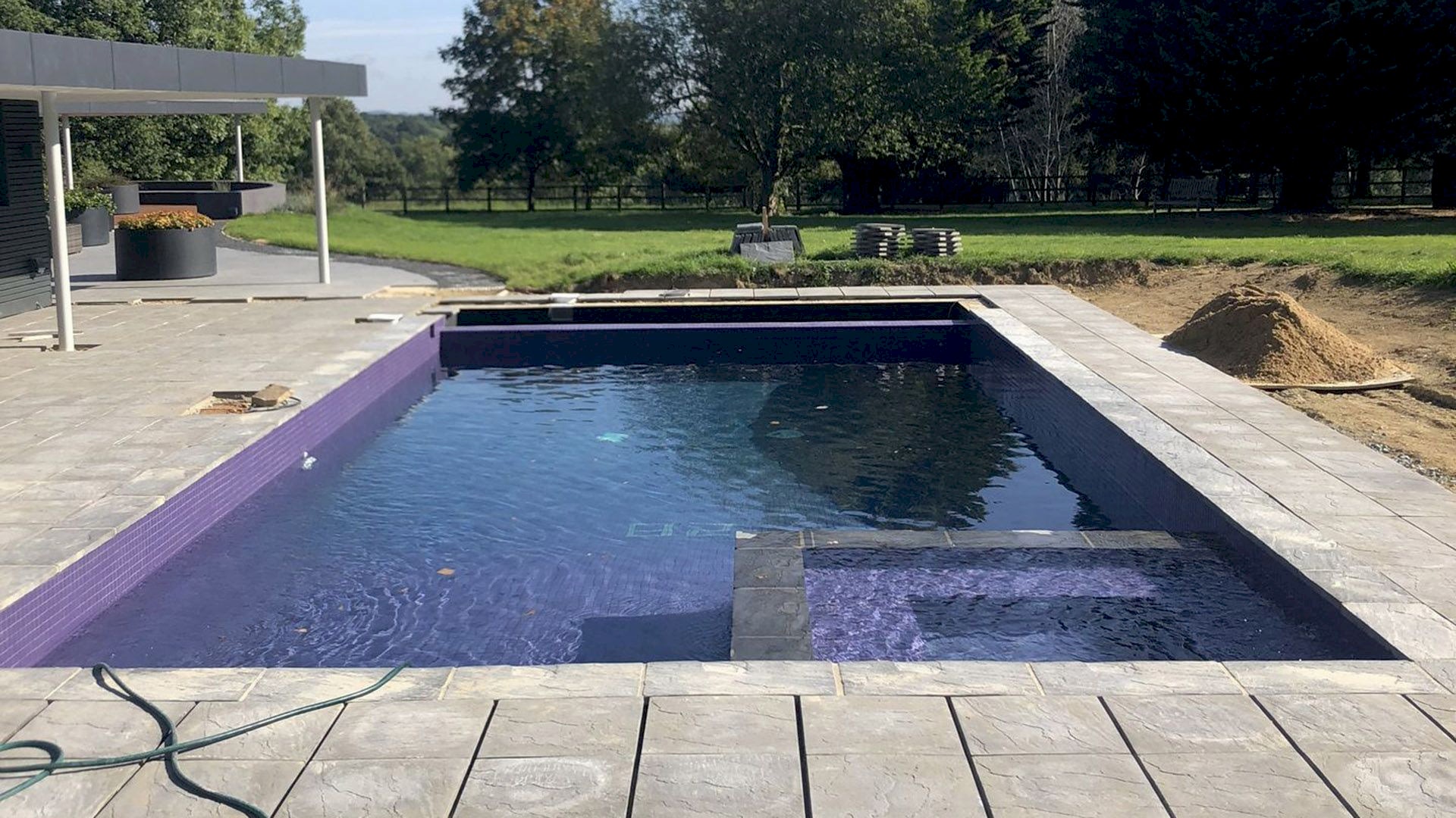Reshaped concrete swimming pool