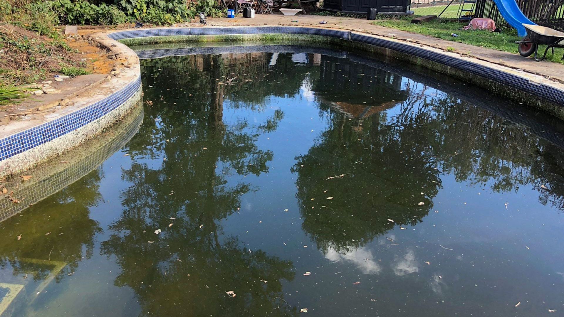 Outdoor swimming pool before reshaping