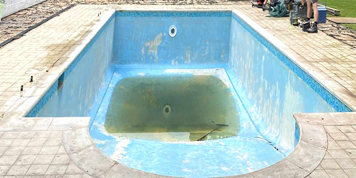 Existing concrete swimmin pool ready for renovation