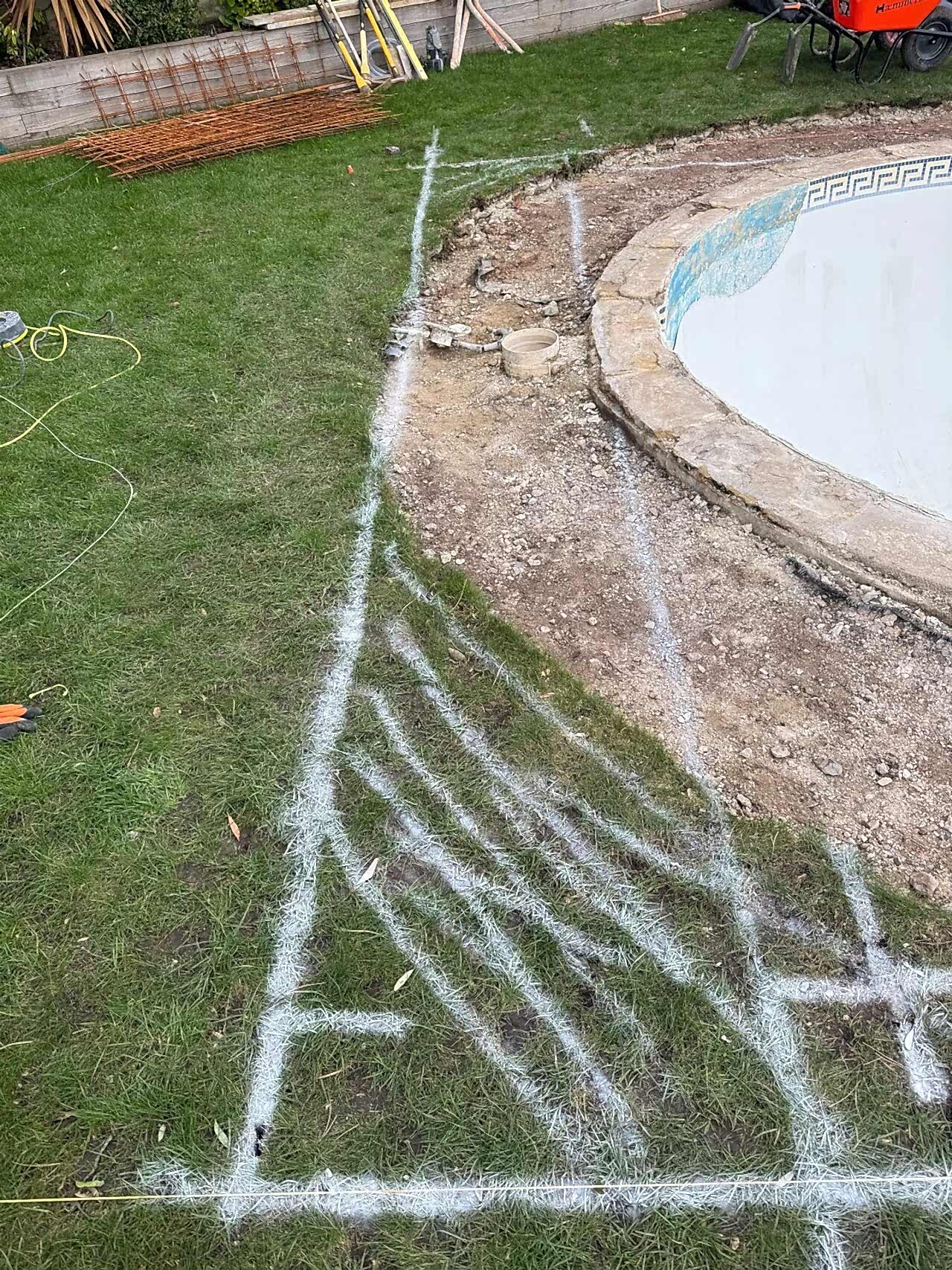 Drawing of the new pool shape over the existing kidney shaped swimming pool