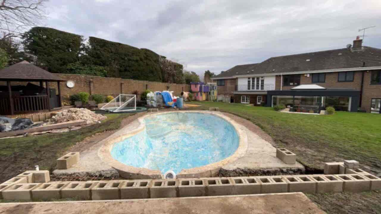 The rubble has been removed from the old swimming pool and the surface has been cleaned for the refurbishment