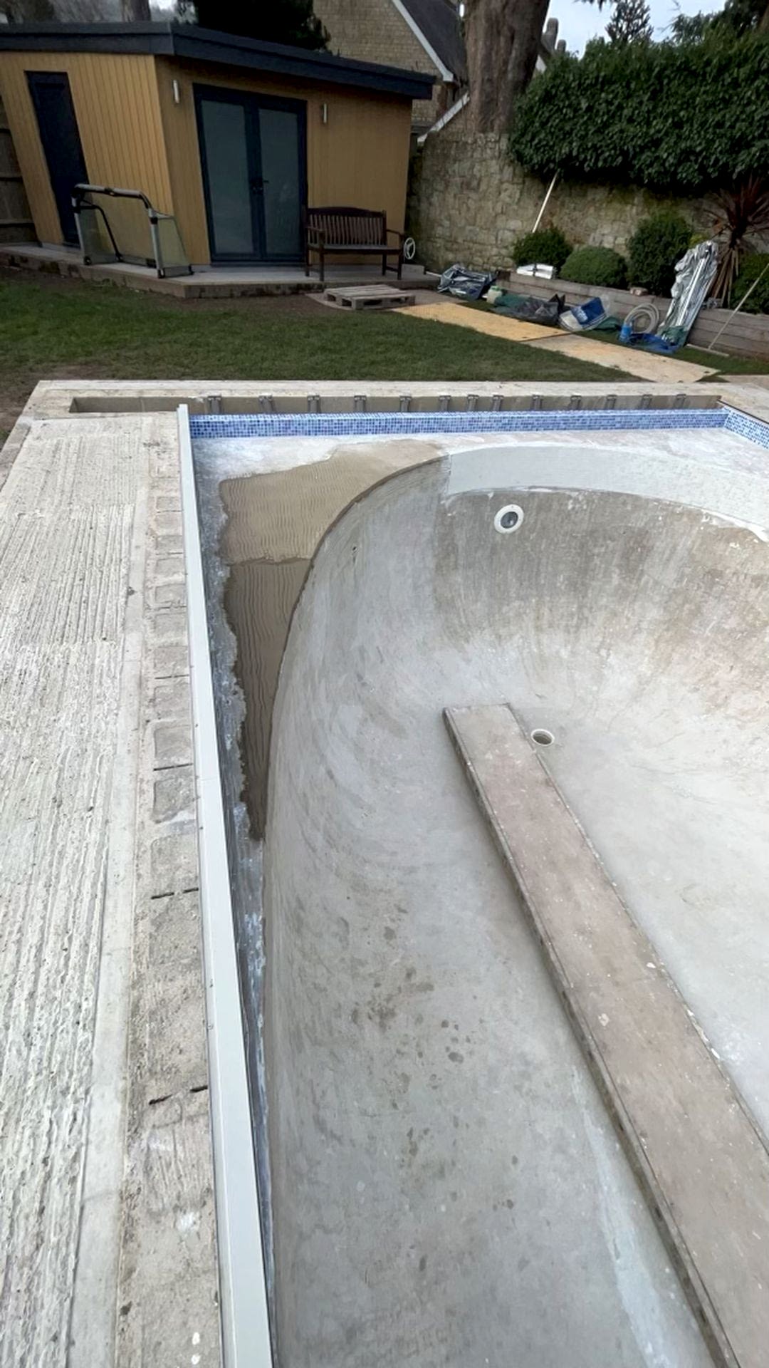The new pool edges are drying and the inside of the pool is getting ready for tiling