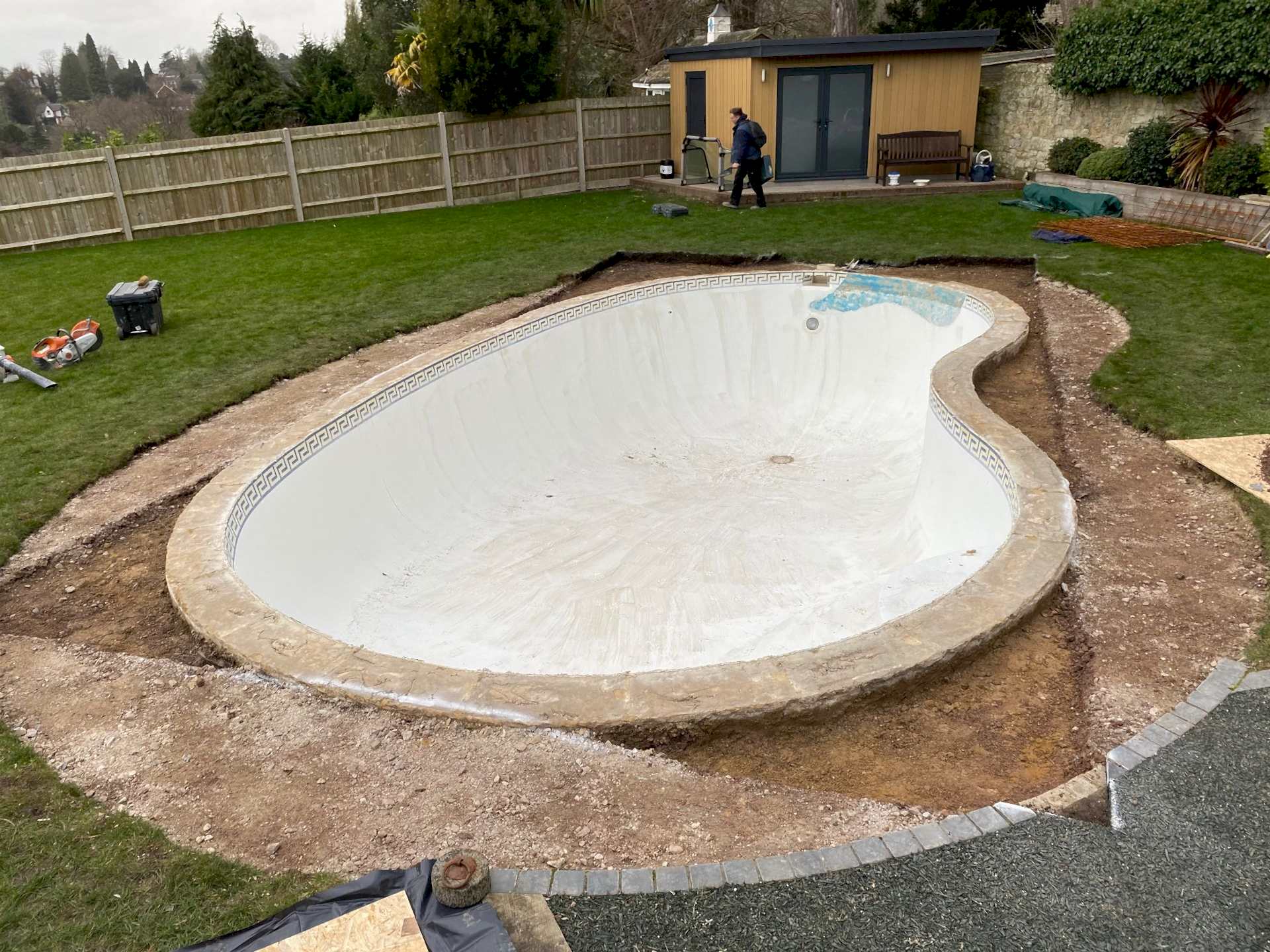 The Fiberglass interior was removed as well as the pavement around the swimming pool