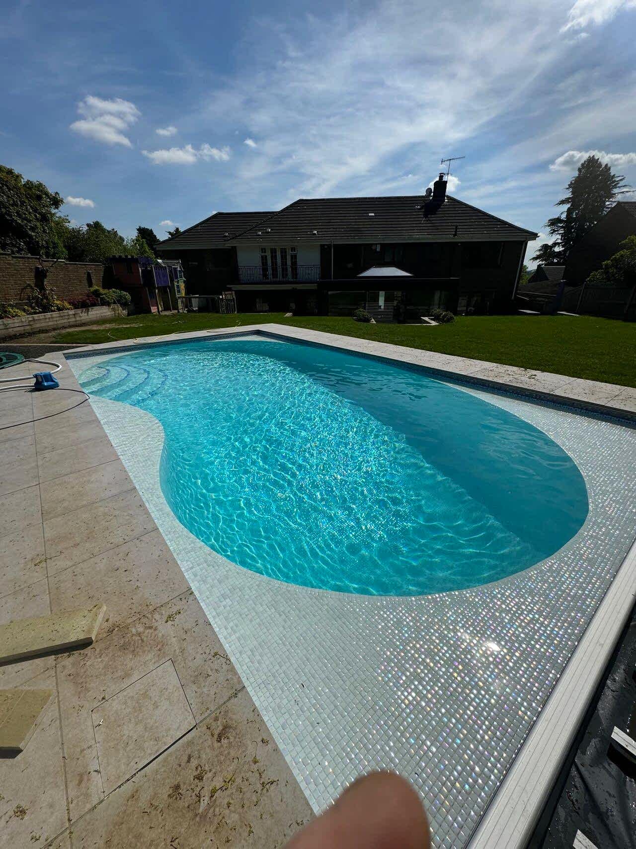 Finished shot of the remodelled of the swimming pool without the automatic pool cover